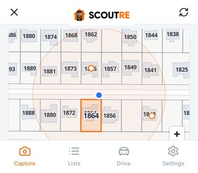 SCOUTRE parcel picker outlining the property in front of the phone