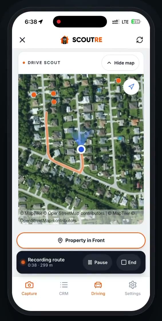 Drive Scout recording a route in SCOUTRE: today's drive drawn in orange with captured properties pinned along it, and a Property in Front button under the map.